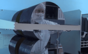 A person working on wafers in fab
